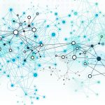 Magnifying glass and documents with analytics data lying on table